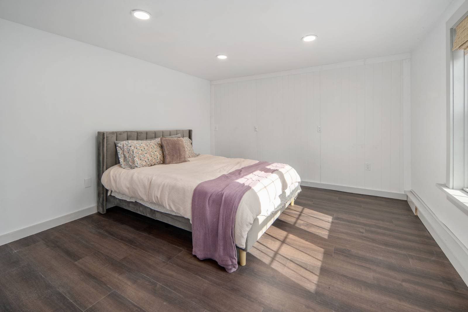 Main home · lower-level bedroom at 17 Walnut St, Cooperstown NY